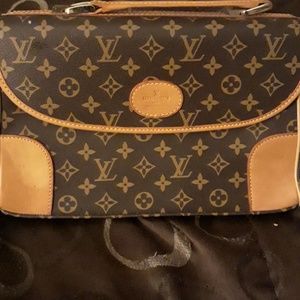 Louis Vuitton strap over shoulder purse